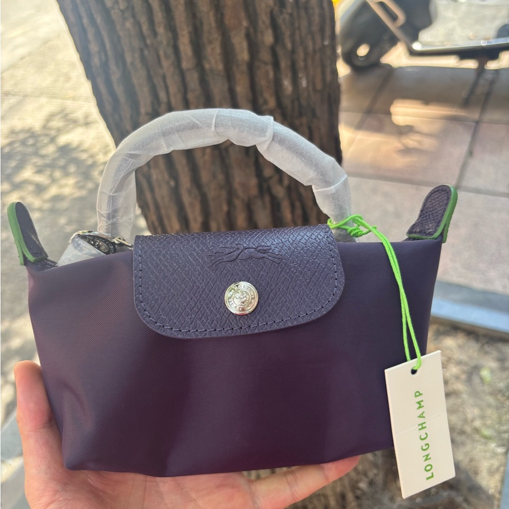 Longchamp mini top-handle bag in plum with neon green trim